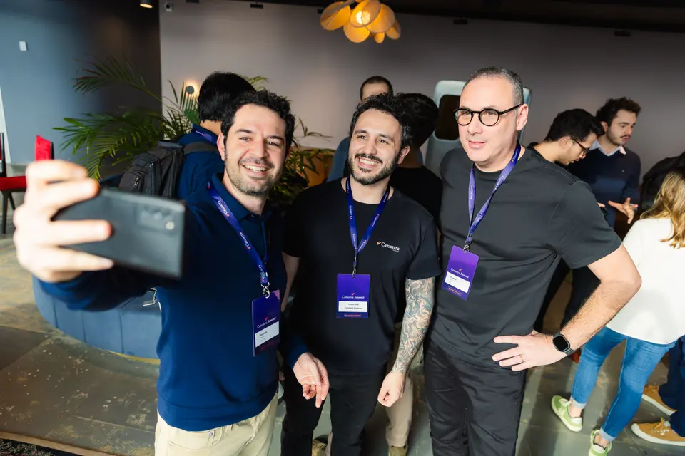 Participants taking a selfie together at the evening gathering