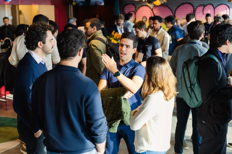 Dense crowd of participants at the evening gathering